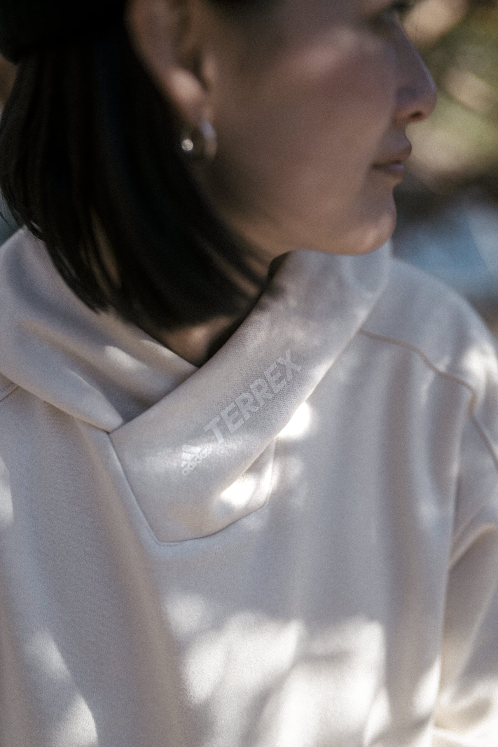 2022 Adidas Terrex Spinnova Collaboration. Woman wearing hoodie.